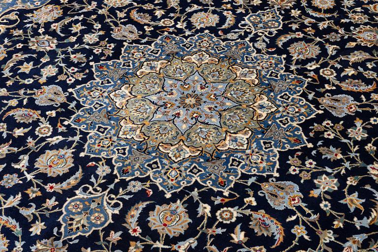 A Royal Keshan carpet, signed, c. 395 x 295 cm.