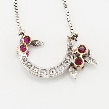 Necklace 18K white gold with faceted rubies and diamonds.