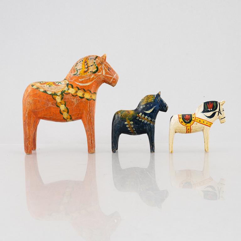 A set of three Dalecarlia horses, around the mid-20th century.