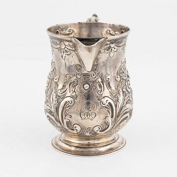 An English silver creamer, London, 1887.