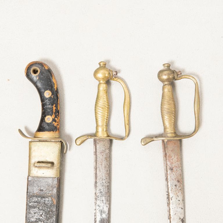 Three Swedish cutlasse 1856 and 1848 pattern.