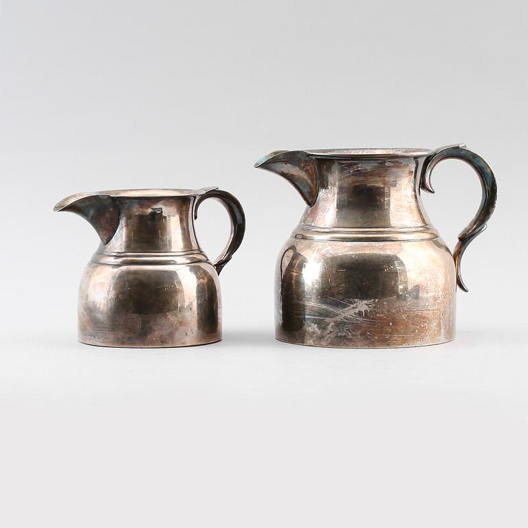 KANNOR, 2 st, nysilver, 1900-talets första hälft.