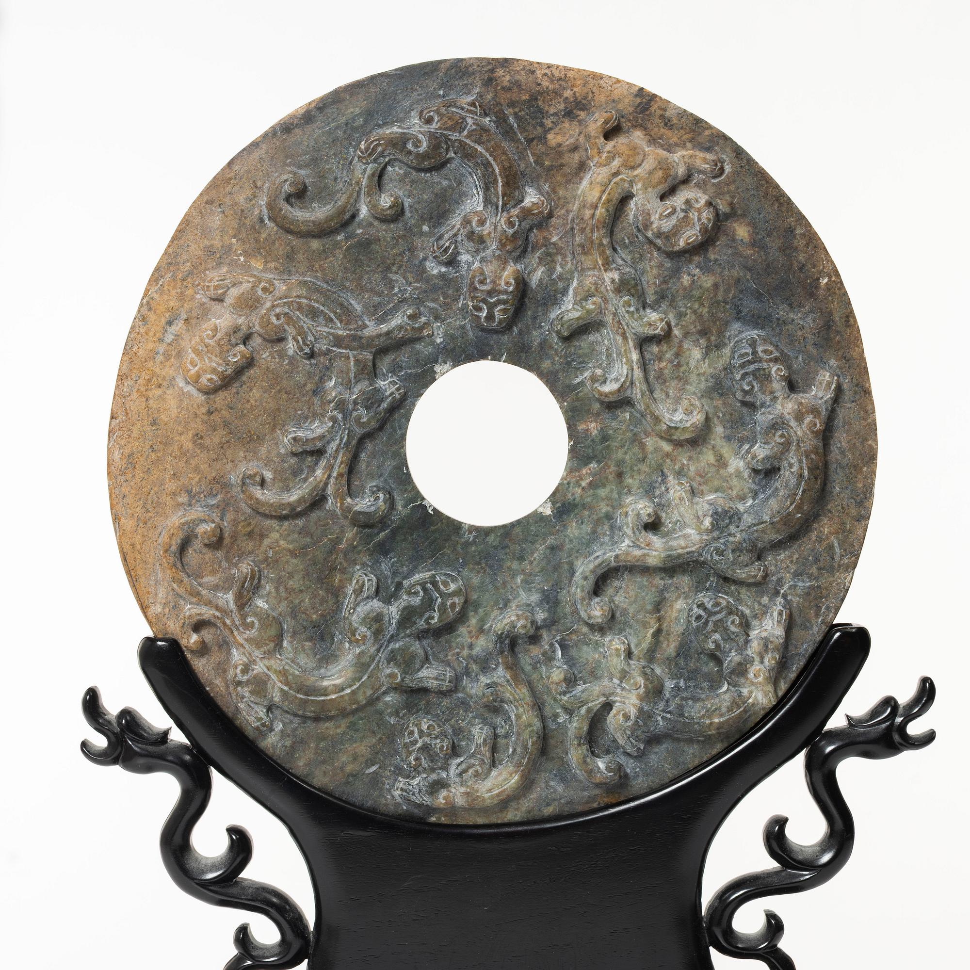 A Chinese stone bi-disc, 20th century.