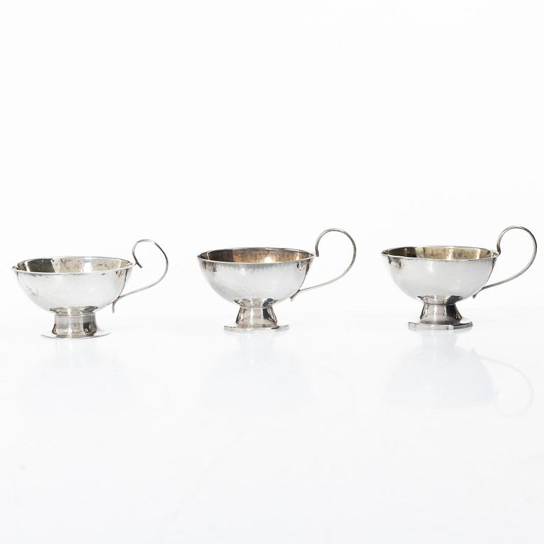 Punchmuggar, 7 st, silver, bl a Cesons, Göteborg 1985.