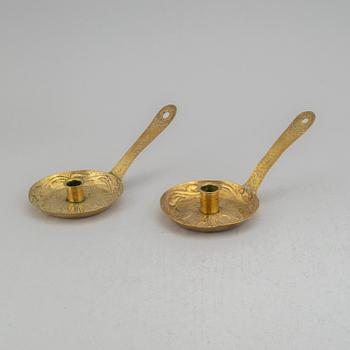 A pair of 19th century brass night light holders.