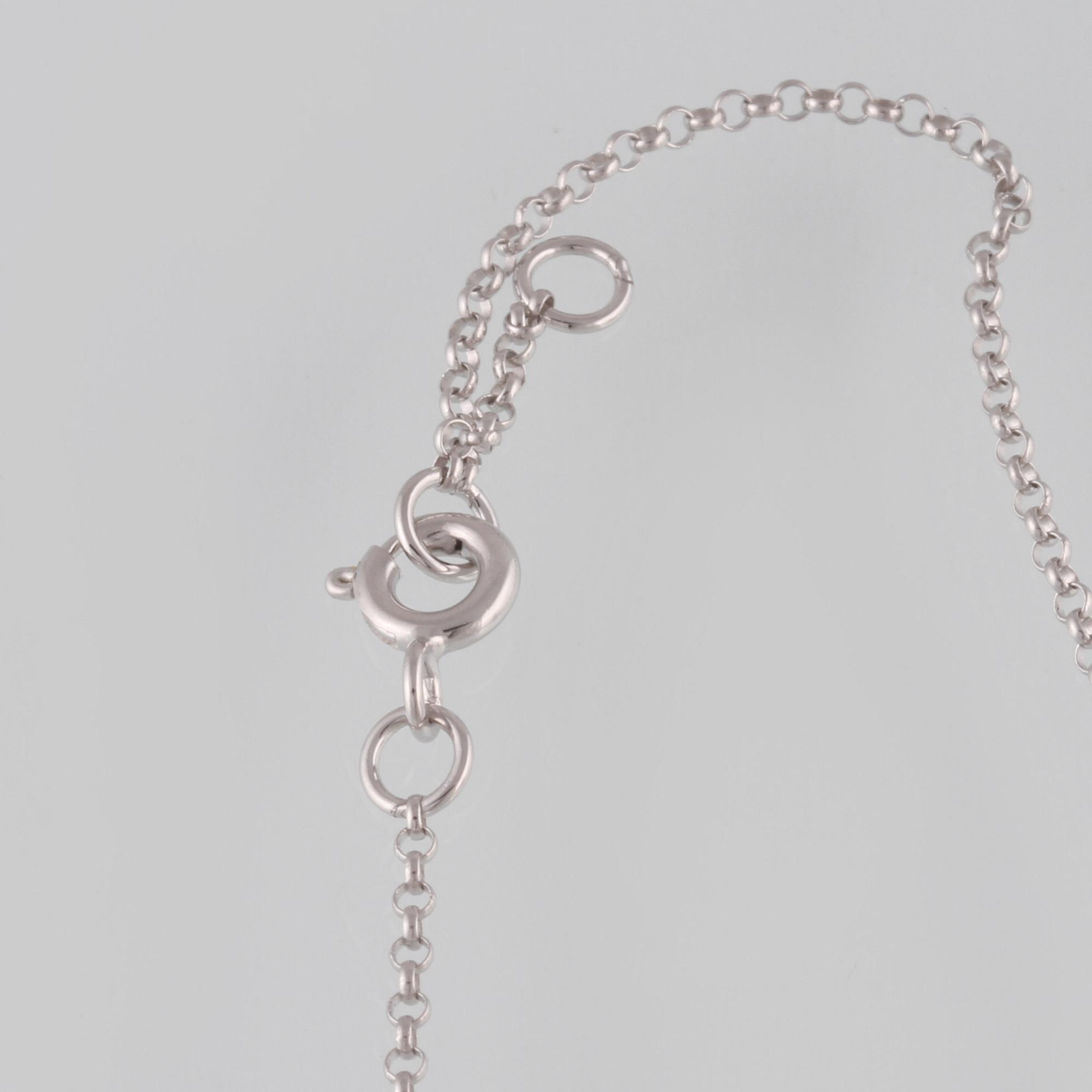 ARMBAND, 18K vitguld med briljantslipade diamanter ca 0.20 ct. Vikt 1,6 gram.