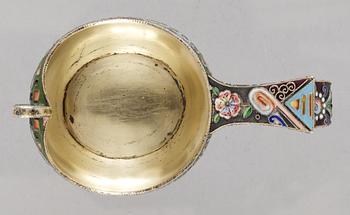 A RUSSIAN PARCEL-GILT AND ENAMEL KOVSH, makers mark of the 11th Artel, Moscow 1908-1917.