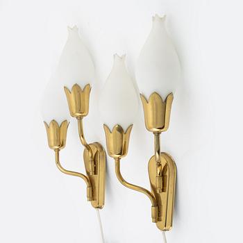 A pair of 'Tulip' brass wall lights, Fog & Mørup, mid 20th Century.