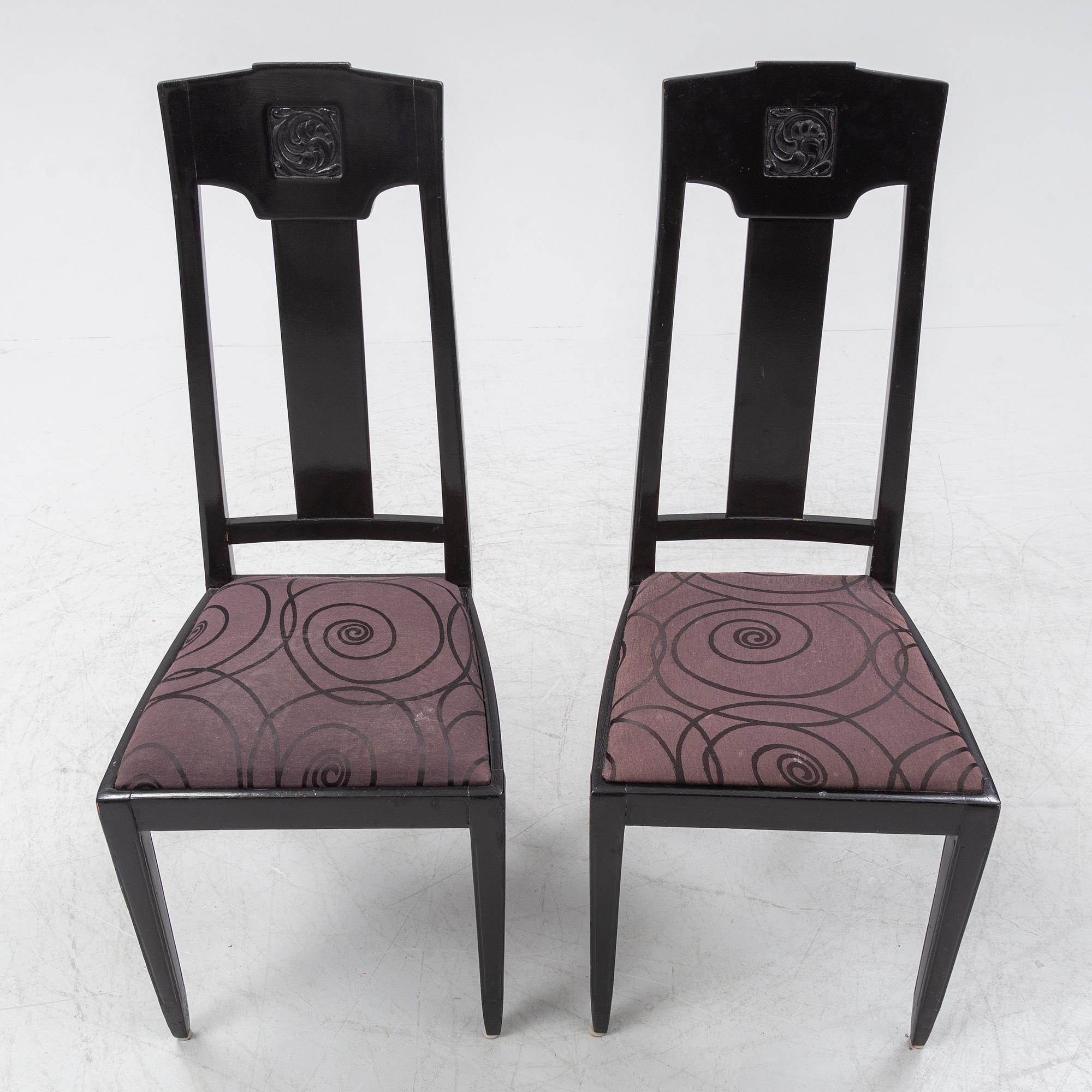 Ten carved oak chairs, Myrstedt & Stern A.-B., Stockholm, early 20th Century.