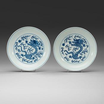 135. A pair of blue and white 'Dragon dishes', Qing dynasty, Daoguang seal mark and period (1821-50).