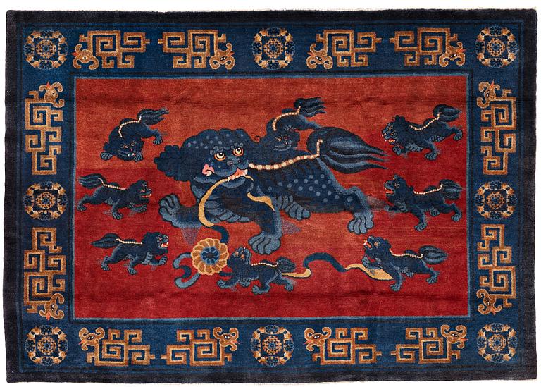 A CARPET, an old Baotou figural, China, ca 162,5 x 233,5 cm.