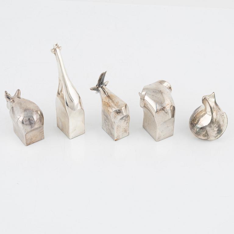 Five silver-plated zinc figurines, including Gunnar Cyrén, Dansk Designs, Japan.