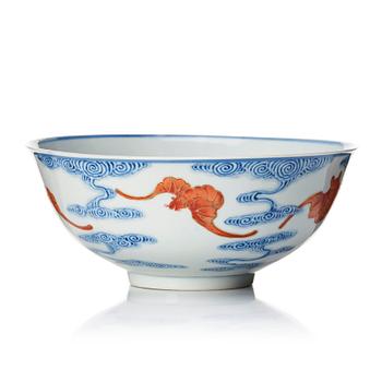 A Chinese iron-red-decorated blue and white Wufu bat bowl, late Qing dynasty, around 1900.