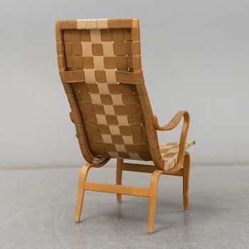 A armchair, model "Eva hög", designed by Bruno Mathsson for Firma Karl Mathsson, dated 1941.