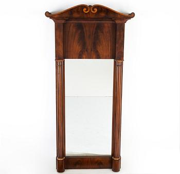 A 19th Century mahogany mirror with a console table.