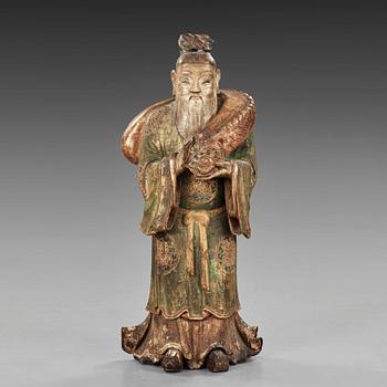 15. A large wooden scultpure of a daoist dignitary, 17/18th Century.