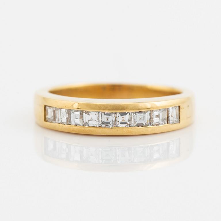 18K gold and princess cut diamond ring.