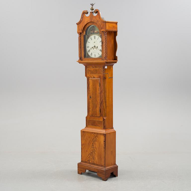 A grandfather clock, England, first half of the 19th century.