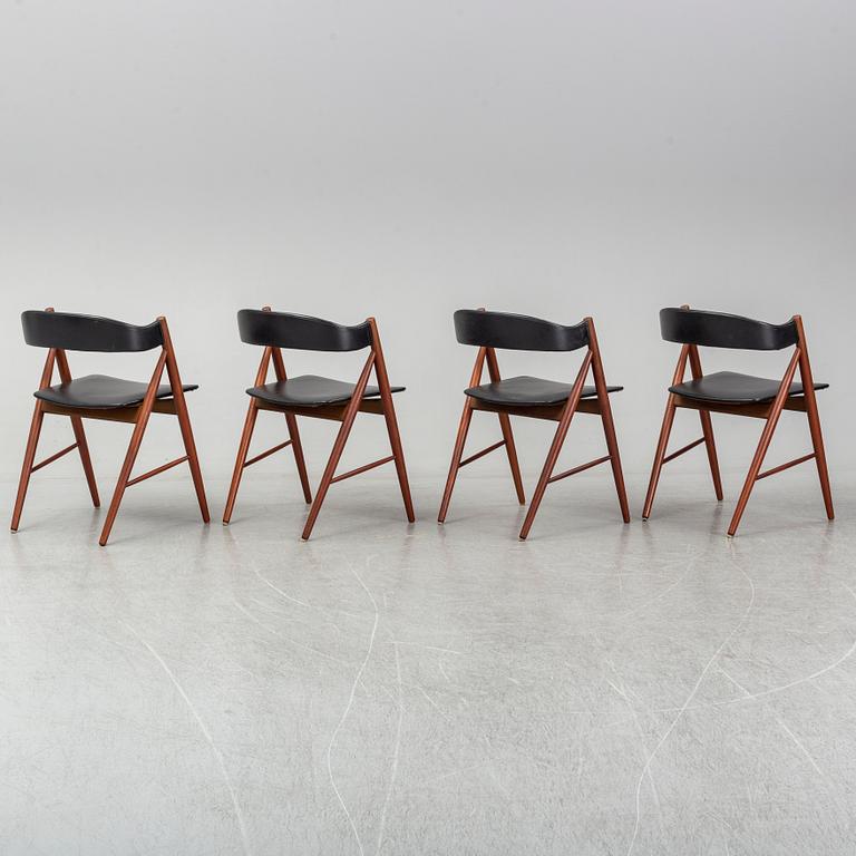 Four 1960s teak chairs.