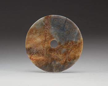 A Chinese archaistic style carved Bi disc.