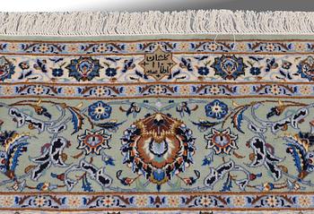 A carpet, Kashan, ca 590 x 418 cm.