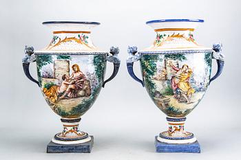 A pir of mid 20th century ceramic classical urns from Firenze Italy.