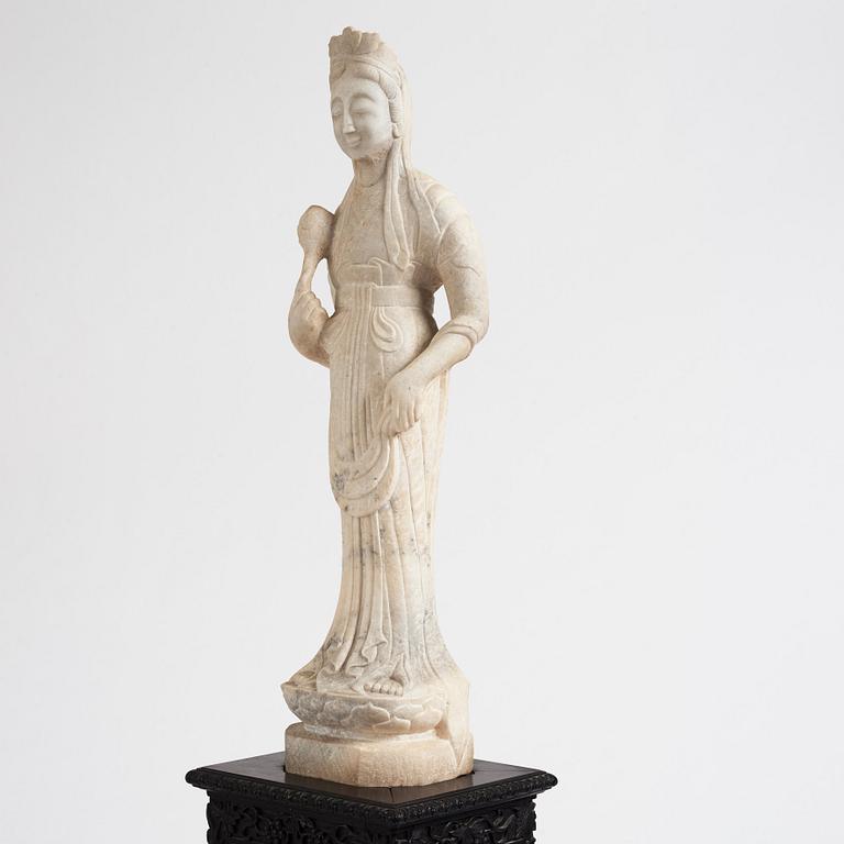 A white stone scultpure of Guanyin, China, presumably early 20th Century.