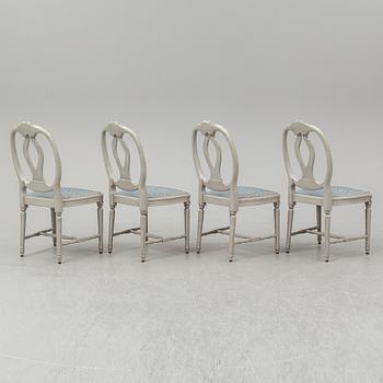 A dining table and four chairs, gustavian style, late 20th century.