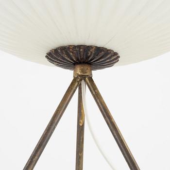 A glass and metal table lamp, probably Italy, 1960s.