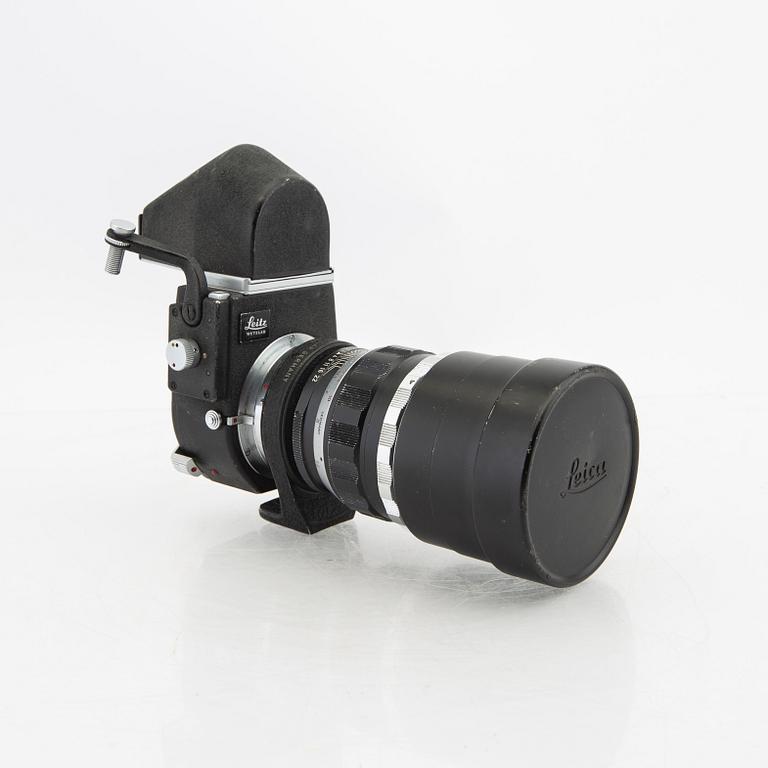 Leica camera with 2 lenses from the middle of the 20th century.