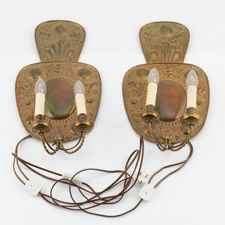 A pair of late 19th century Baroque style brass sconces.