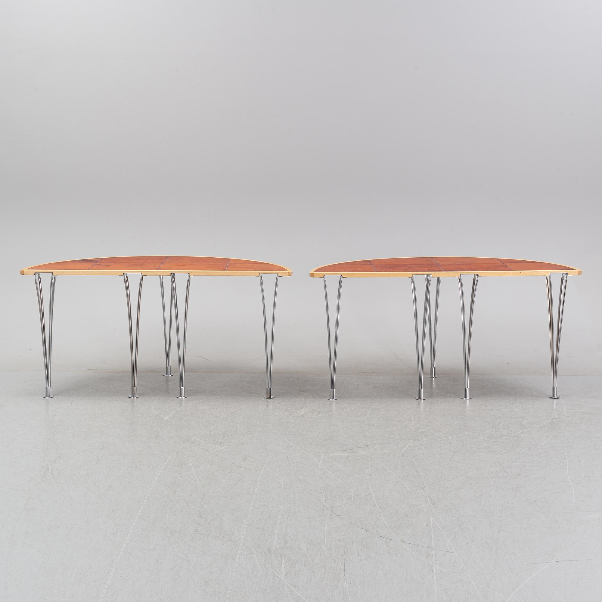 A birch and leather dining table in two parts, Mathsson International, 21th century.