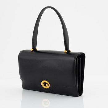 Hermès, a black leather 'Boutonniere' bag, 1960's.