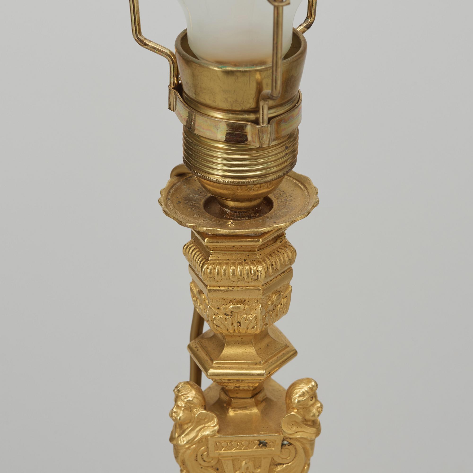 A pair of ormolu table lamps second half of the 19th century.