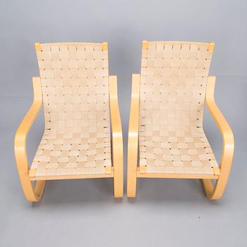 ALVAR AALTO, Pair of model '406' armchairs for Artek, late 20th century .