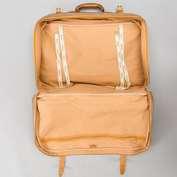 A Large Vintage Micro GG canvas Soft Suitcase.