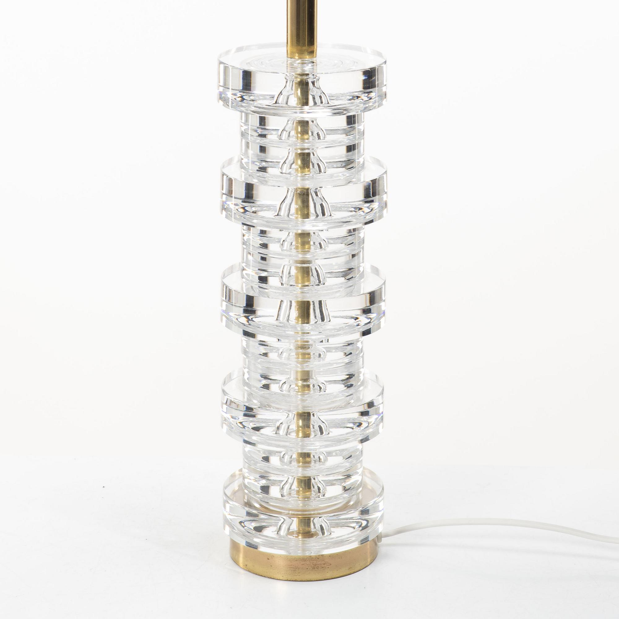 Carl Fagerlund, A table lamp in glass and brass, Orrefors.