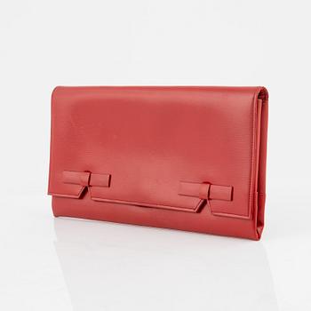 Christian Dior, a red box calf leather clutch.