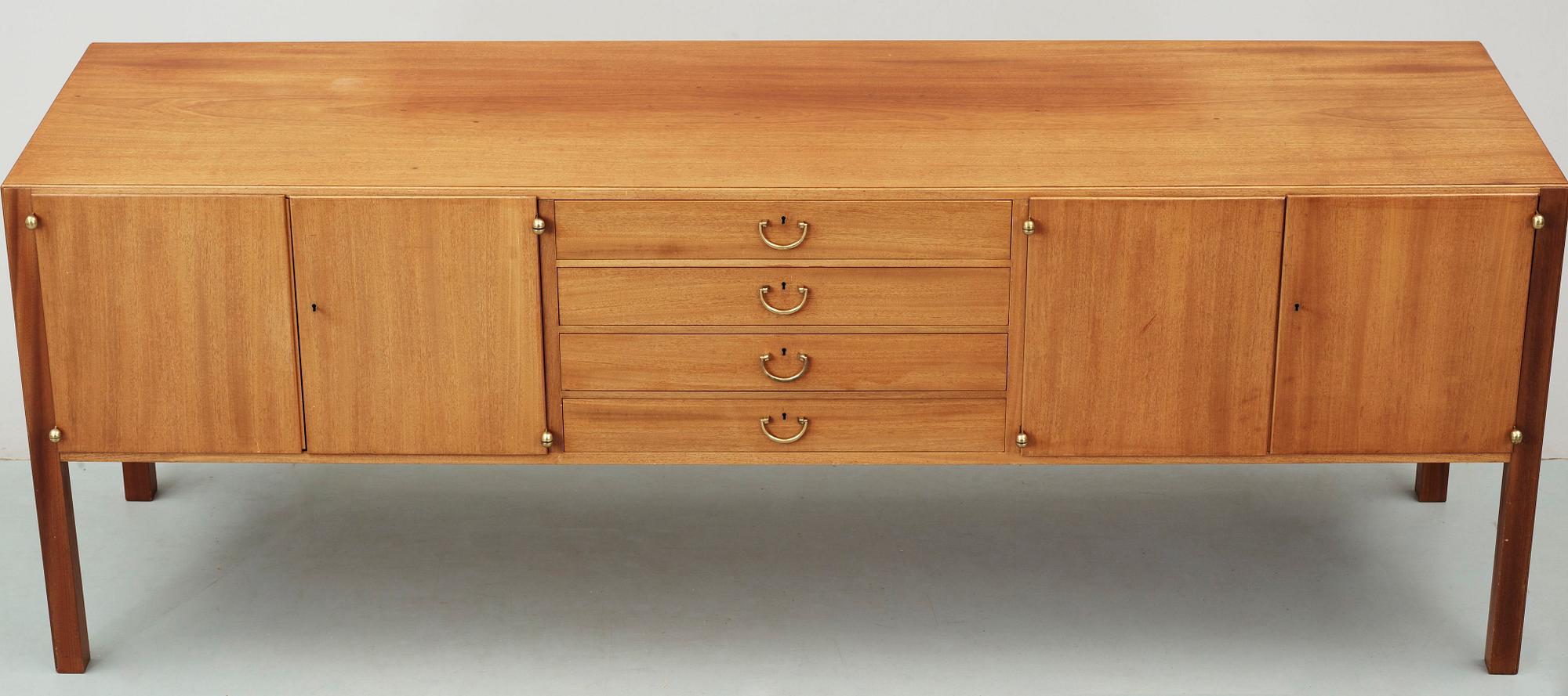 A Josef Frank mahogany sideboard by Svenskt Tenn, model 1015.