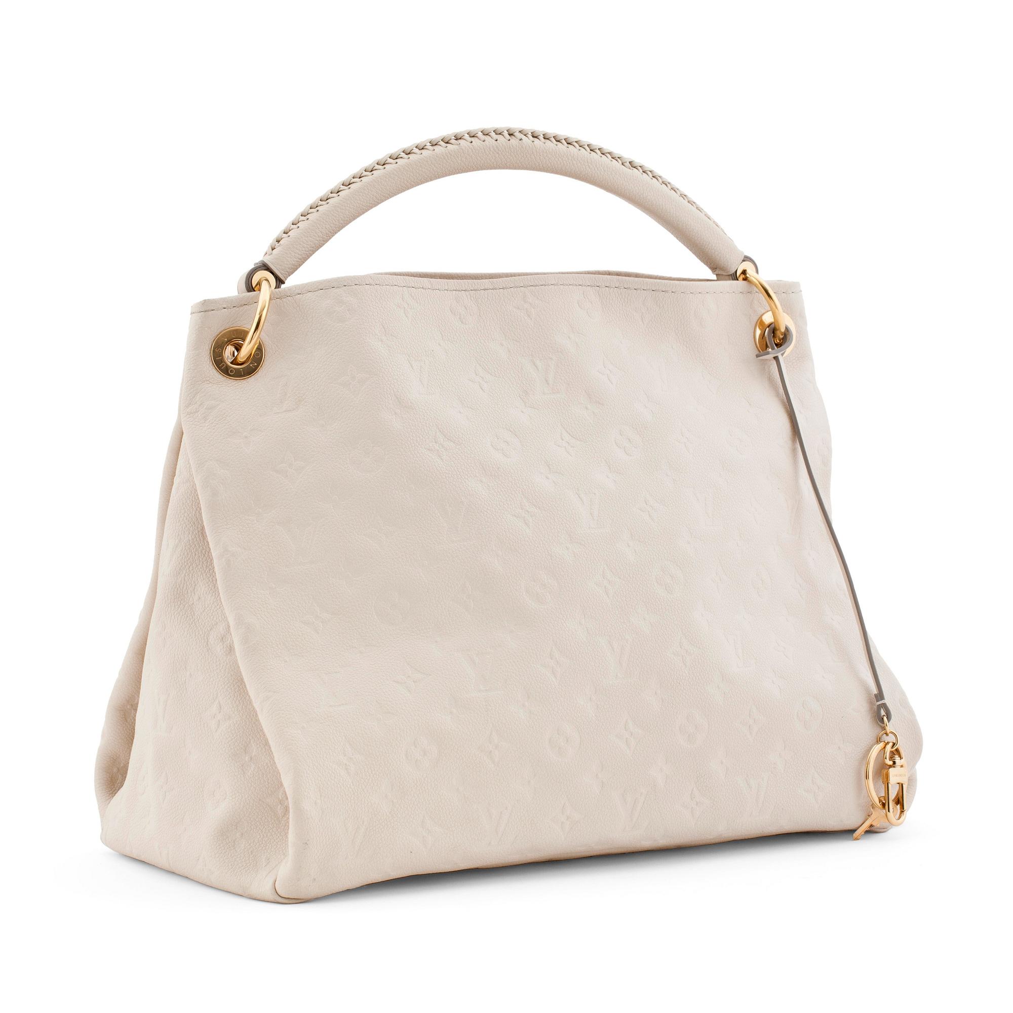 LOUIS VUITTON, a creme colored shoulder bag with embossed monogram print, "Artsy MM".