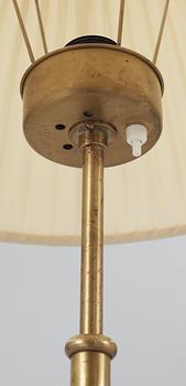 A Josef Frank brass floor lamp by Svenskt Tenn.