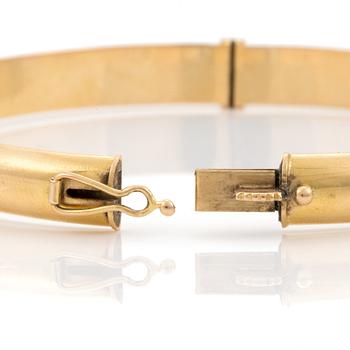 ARMRING, Ø 62 mm. 18K guld. Vikt 12 gr.