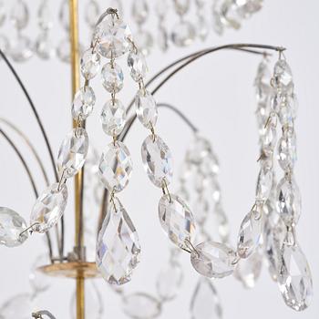 A late Gustavian gilt brass and cut glass eight-branch chandelier, Stockholm, late 18th century.