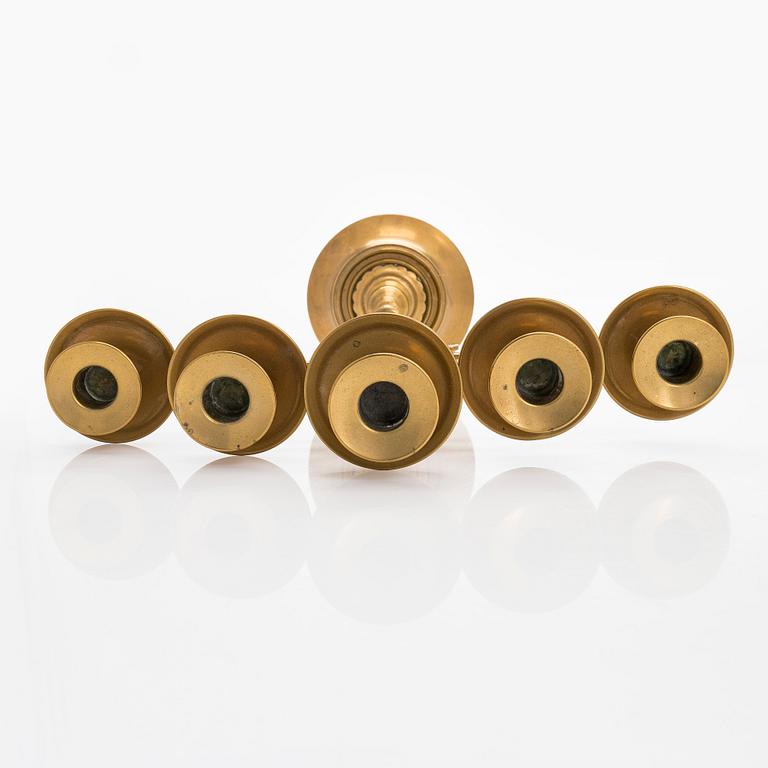 A pair of brass candelabras, early 20th century.