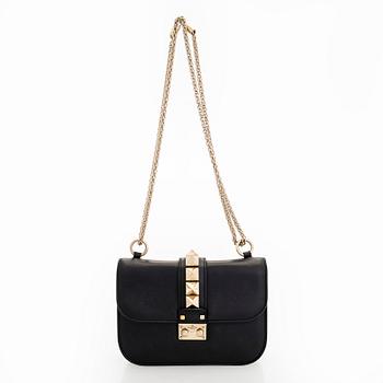 Valentino Garavani, a 'Glam Lock' bag.