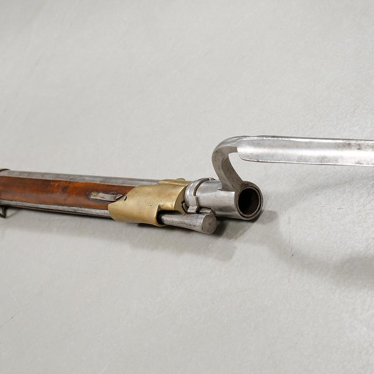 A percussion rifle with bayonet, probably swedish model 1815-45.
