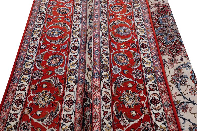 A carpet, Esfahan, part silk, c. 317 x 202 cm.