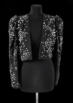 384. A black bolero by Yves Saint Laurent.