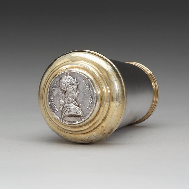 A 18th century parcel-gilt beaker and cover, marks of Michael May, Brassó (Kronstadt 1769-1776).
