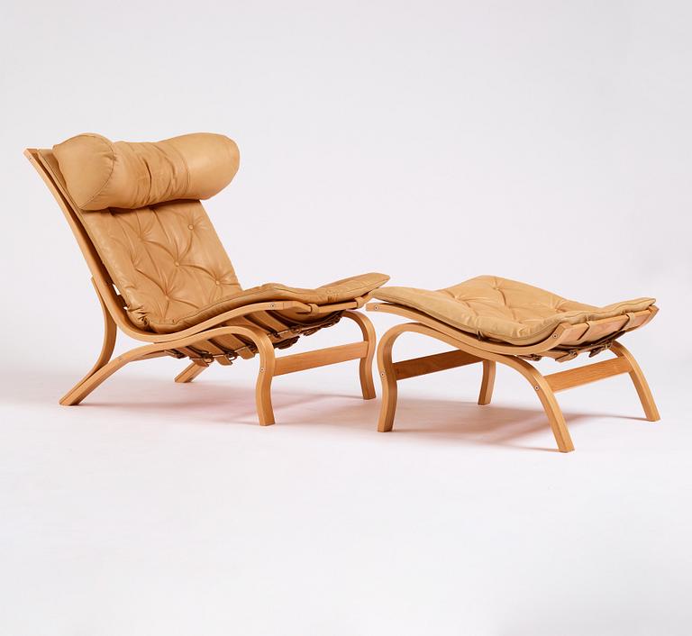 Arne Norell, a 'Scandi', easy chair and ottoman, Norell Möbel AB, Sweden 1970s.